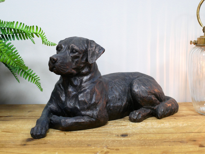 Laying down resin dog ornament 41 cm long