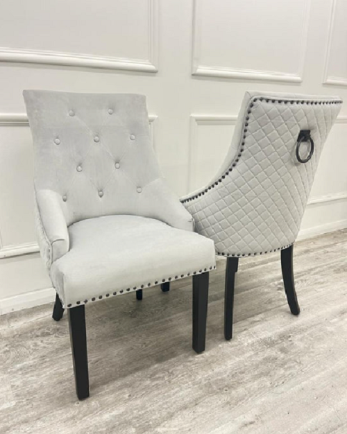 2 Light Grey Velvet Dining Chairs with Black Door Knocker & Black legs