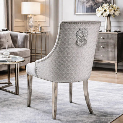 2 Silver Grey velvet dining chairs with chrome legs & lion knocker