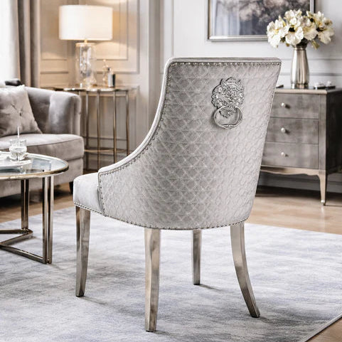 2 Silver Grey velvet dining chairs with chrome legs & lion knocker