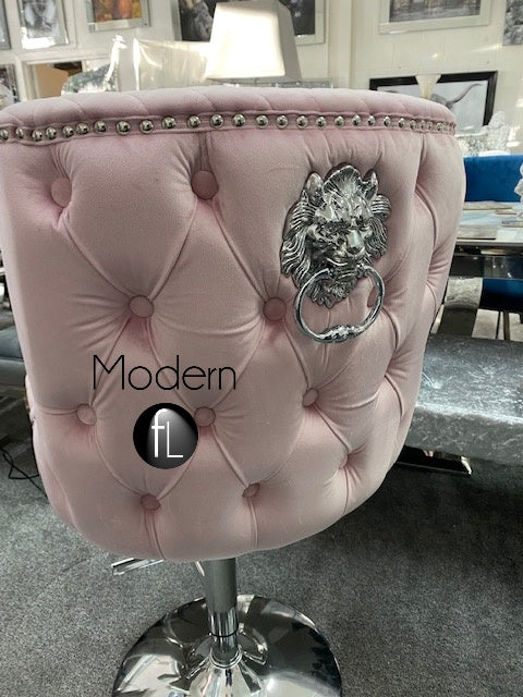 Pink velvet swivel bar stool with chrome Lion knocker and cross stitch