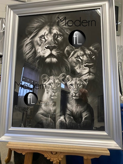 Vintage style lion pride family picture in a silver wood frame