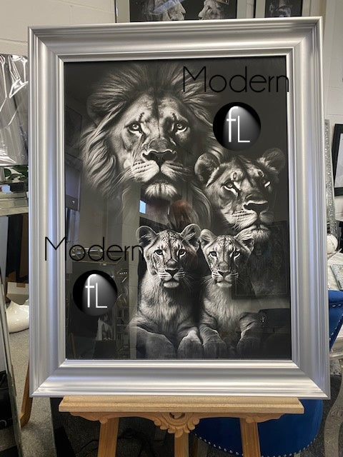 Vintage style lion pride family picture in a silver wood frame