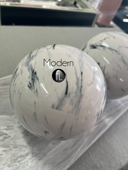 Pair of white marble effect decorative balls