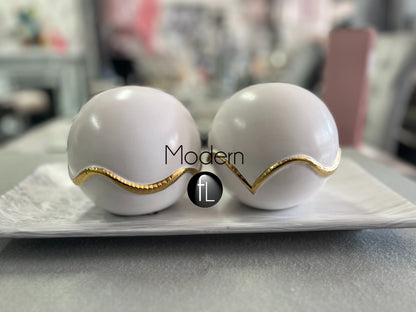 Pair of gold & white decorative balls