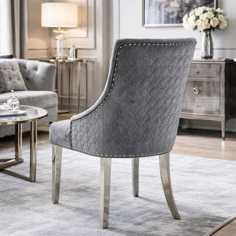 2 Grey velvet dining chairs with geometric cross stitch and chrome legs