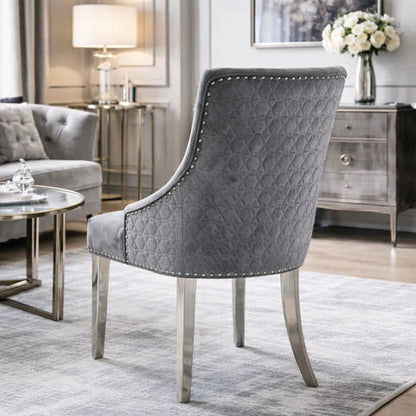 2 Grey velvet dining chairs with geometric cross stitch and chrome legs