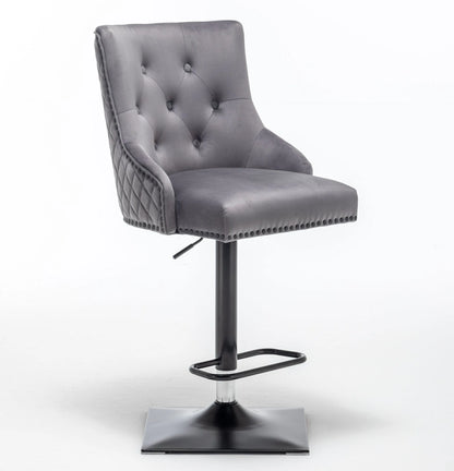 Grey velvet swivel bar stool with door knocker & cross stitch, black metal base