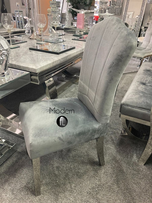 2x Grey velvet dining chairs with chrome leg