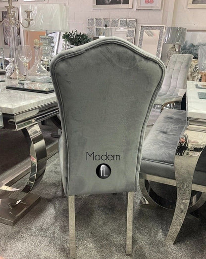 2x Grey velvet dining chairs with chrome leg