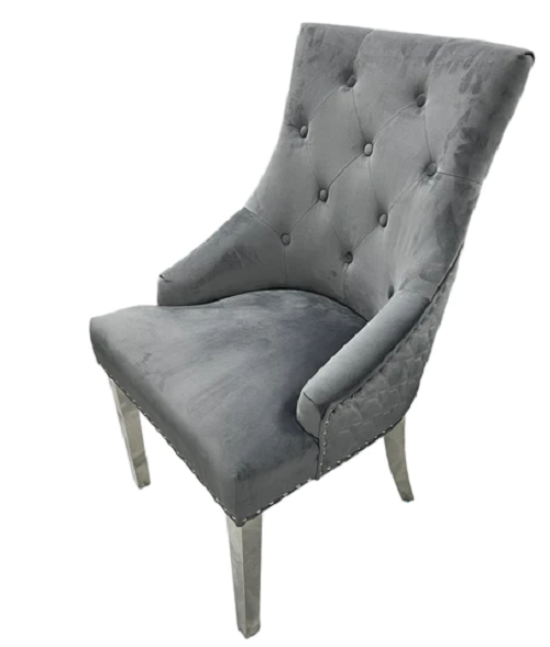 2 Grey velvet dining chairs with geometric cross stitch and chrome legs