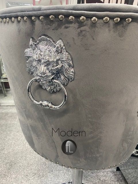 Grey velvet swivel bar stool with Lion knocker