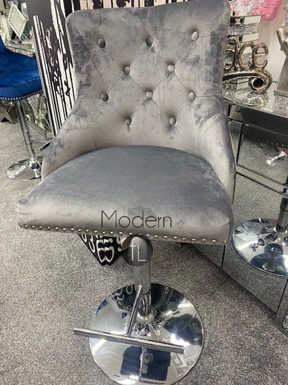 Grey velvet swivel bar stool with Lion knocker