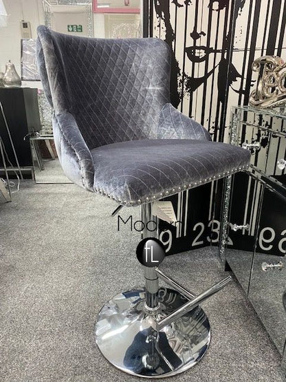 Silver Grey velvet swivel bar stool with chrome Lion knocker and cross stitch